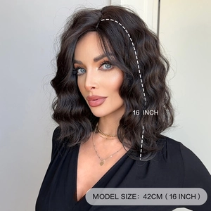 Mid-length black wavy wig for women with 16 inch length marking shown on professional model
