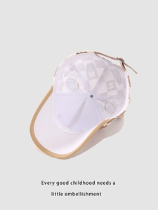 Detail view of adjustable metal buckle and interior support of kids plaid baseball cap