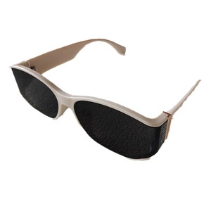 Vintage cream white rectangular sunglasses with black lenses and gold metal accents