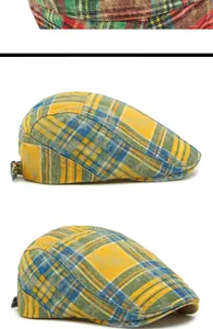 Detail view of vintage British style plaid berets showing tweed texture and metal buckle