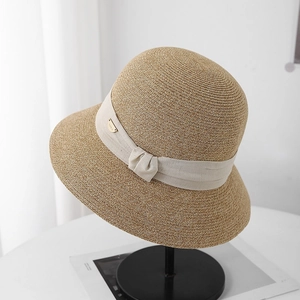 Chapeau de soleil élégant en paille pour femme avec ruban et nœud style français