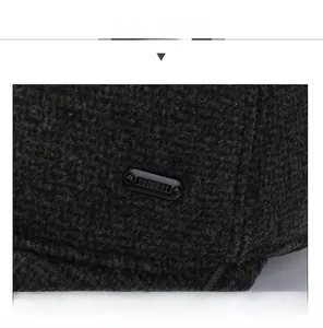 Close-up of black wool baseball cap texture with modern rectangular side detail