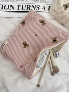 Pink corduroy makeup bag with cute bear embroidery and portable storage design