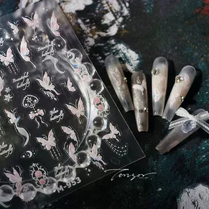 Detail of M-953 butterfly nail art stickers with pink butterfly patterns and gold foil