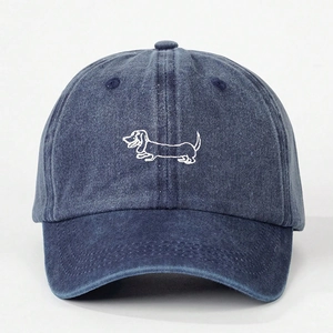 Adjustable washed navy denim baseball cap featuring white dachshund dog embroidery