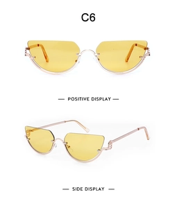 Front and side view of retro half-rim cat eye sunglasses with gold metal frame and yellow lenses