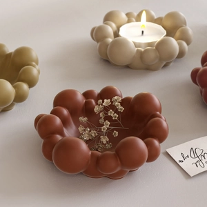 Close-up of matte bubble cloud resin tray for jewelry storage and aromatherapy candle