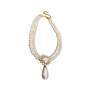 Double-layered pearl necklace featuring a diamond-studded water drop and floral pendant