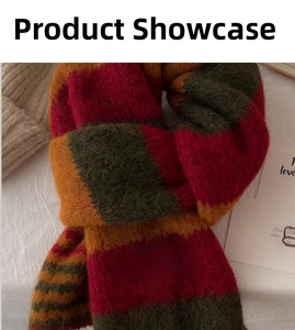 Close-up of thick knitted wool scarf with red, dark green and yellow wide stripes