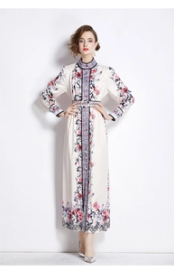 Front view of floral print long dress featuring a stand collar and matching waist belt