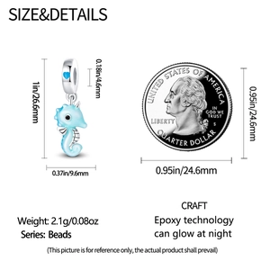 Luminous seahorse bead dimensions showing 26.6mm height and size comparison with a coin