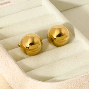 Detailed close-up of 16K gold plated 316L stainless steel spherical stud earrings