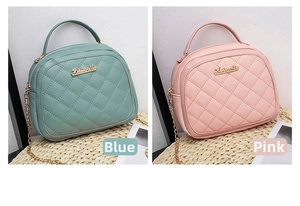 Detailed view of quilted faux leather handbags in mint green and pink with gold chain straps