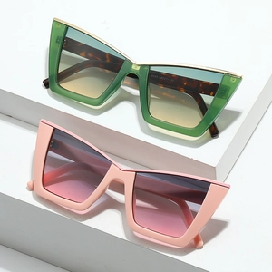 Trendy oversized cat-eye sunglasses with gradient lenses in green and pink frames
