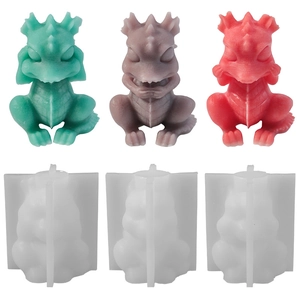 Dragon silicone candle mold set showing three finished resin dragons and mold parts
