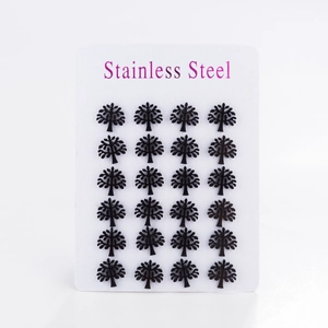 Close-up of 12 pairs of matte black Tree of Life stainless steel stud earrings on a card