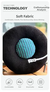 Macro detail of plush vinyl record pillow showing soft texture and fine stitching
