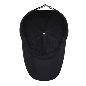 Internal structure of black quick-dry baseball cap with reinforced seams and strap