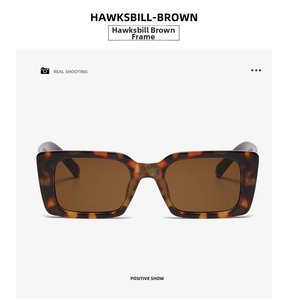 Detailed front view of square vintage tortoiseshell sunglasses with brown lenses