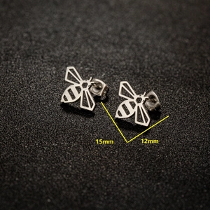 Detailed view of silver bee earrings with hollow geometric patterns and 15mm dimensions