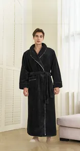 Close-up of thick black coral fleece robe with white trim and waist tie for men