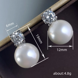 Elegante imitatie pareloorbellen met kunstdiamanten en gedetailleerde afmetingenlabels