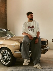 Λευκό oversized βαμβακερό t-shirt με τύπωμα για αμερικάνικο ρετρό στυλ δρόμου