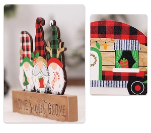 Detail of wooden Christmas gnome ornament and camper van decoration with plaid patterns