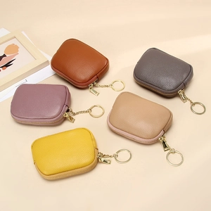 Genuine leather mini coin purses in five colors with zipper and metal keychain ring