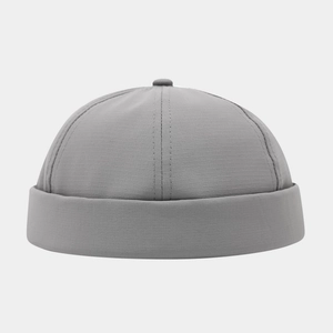 Detailed texture of light gray quick-dry docker cap with brimless rolled edge