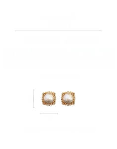 Macro detail of vintage square pearl earrings with micro-inlaid zircons and silver needles