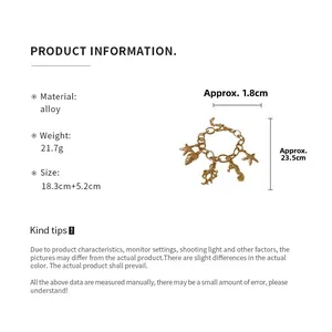Detail view of ocean-themed gold charm bracelet showing seahorse and starfish size specs
