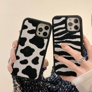 Plush faux fur cow and zebra print phone cases for iPhone 16 Pro Max stylish protection