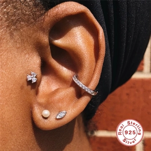 S925 sterling silver earring set with triangle studs, pearls, and zircons on model