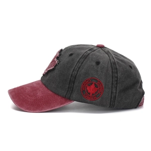 Macro detail of the Canada maple leaf embroidery on a washed vintage baseball cap