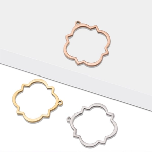 Three hollow clover pendants in rose gold, gold, and silver finishes for DIY jewelry