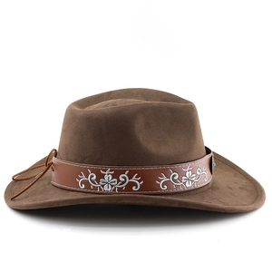 Detail of brown suede cowboy hat featuring white floral embroidery and turquoise stone