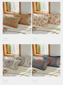 Detail view of 4-layer cotton gauze pillow covers featuring lemon and mandala prints