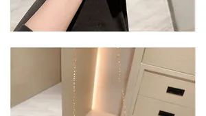 Detail of elegant gold metal chain strap on premium black velvet evening clutch bag