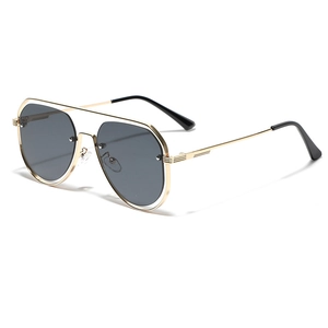 Classic gold aviator sunglasses with dark grey lenses and hollow metal rivet frames