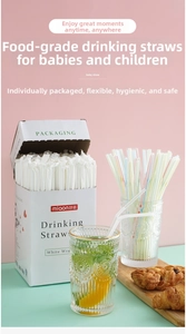 Detailed view of individual paper-wrapped flexible straws with food-grade storage box