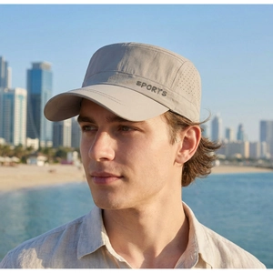 Detail of khaki cadet cap featuring laser-cut ventilation holes and sports logo