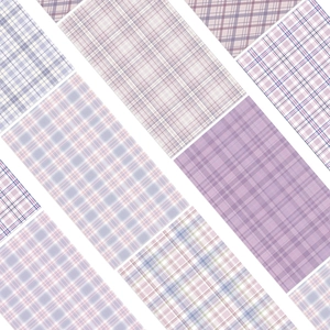 Close-up of checkered macaron stickers with purple, pink and light blue plaid patterns