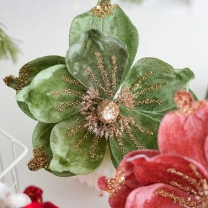 Detailed macro view of velvet magnolia flower with gold glitter and beads decoration