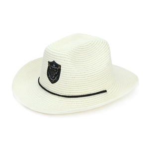 Detailed view of white straw cowboy hat with black braided rope and bull head metal crest
