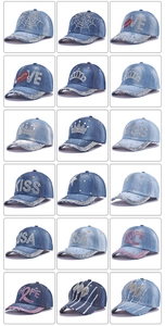 Macro display of denim baseball caps with rhinestone patterns like crowns and stars