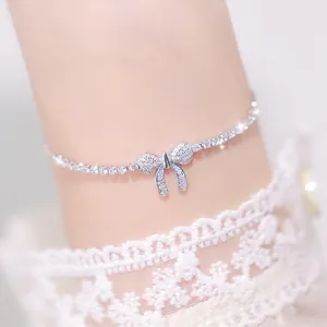 Elegant bow tie bracelet with full diamond zircon inlay on a delicate single row chain