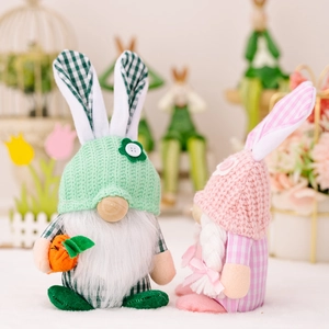 Pink and green knitted Easter rabbit gnomes with soft faux fur beard for spring decor