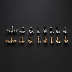 Titanium steel body piercing jewelry set with cubic zirconia in silver and gold finish
