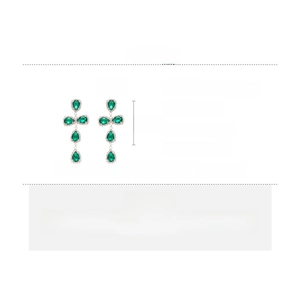 Detail showing green teardrop tassel earrings with size 8.5cm x 3.5cm and 24.6g weight